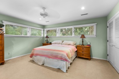 Nestled on a half-acre homesite beneath majestic oak trees on The Seabrook Island Club in South Carolina - for sale on GolfHomes.com, golf home, golf lot