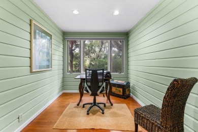 Nestled on a half-acre homesite beneath majestic oak trees on The Seabrook Island Club in South Carolina - for sale on GolfHomes.com, golf home, golf lot