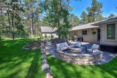 Stunning Stucco and Stone Rancher with Detached Garage/Workshop on Woodmoor Pines Country Club in Colorado - for sale on GolfHomes.com, golf home, golf lot