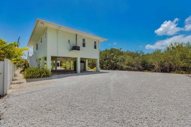 Priced to SELL! Experience unparalleled coastal living on serene on Sombrero Golf and Country Club in Florida - for sale on GolfHomes.com, golf home, golf lot