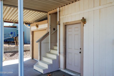 Enjoy Beautiful Lake & Mountain Views From Your Roof Deck With on The Refuge Golf and Country Club in Arizona - for sale on GolfHomes.com, golf home, golf lot