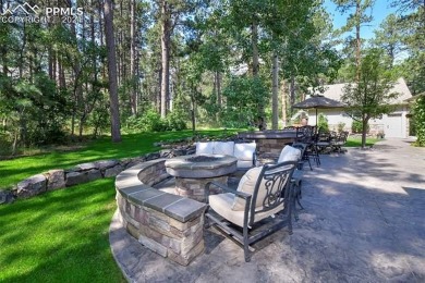 Stunning Stucco and Stone Rancher with Detached Garage/Workshop on Woodmoor Pines Country Club in Colorado - for sale on GolfHomes.com, golf home, golf lot