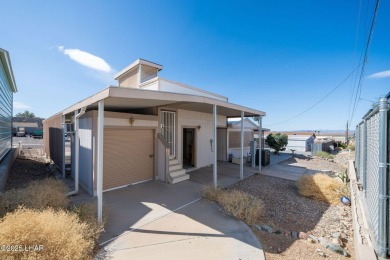 Enjoy Beautiful Lake & Mountain Views From Your Roof Deck With on The Refuge Golf and Country Club in Arizona - for sale on GolfHomes.com, golf home, golf lot