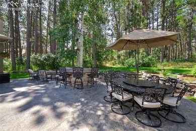 Stunning Stucco and Stone Rancher with Detached Garage/Workshop on Woodmoor Pines Country Club in Colorado - for sale on GolfHomes.com, golf home, golf lot