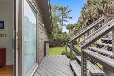 Nestled on a half-acre homesite beneath majestic oak trees on The Seabrook Island Club in South Carolina - for sale on GolfHomes.com, golf home, golf lot