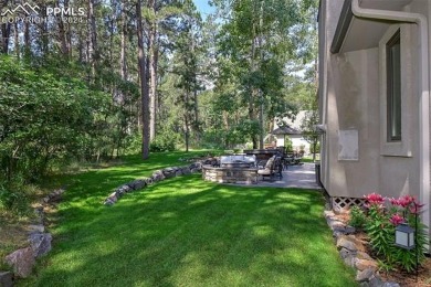 Stunning Stucco and Stone Rancher with Detached Garage/Workshop on Woodmoor Pines Country Club in Colorado - for sale on GolfHomes.com, golf home, golf lot