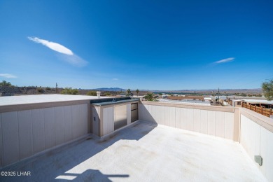 Enjoy Beautiful Lake & Mountain Views From Your Roof Deck With on The Refuge Golf and Country Club in Arizona - for sale on GolfHomes.com, golf home, golf lot