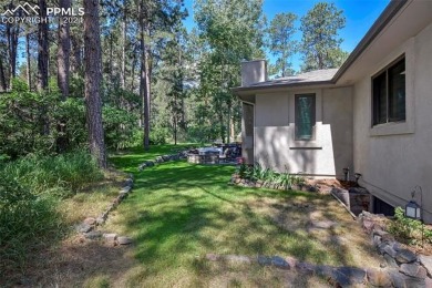 Stunning Stucco and Stone Rancher with Detached Garage/Workshop on Woodmoor Pines Country Club in Colorado - for sale on GolfHomes.com, golf home, golf lot