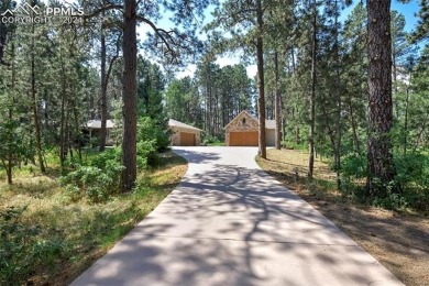 Stunning Stucco and Stone Rancher with Detached Garage/Workshop on Woodmoor Pines Country Club in Colorado - for sale on GolfHomes.com, golf home, golf lot