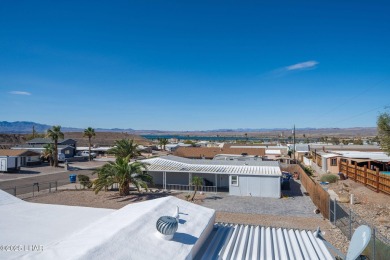 Enjoy Beautiful Lake & Mountain Views From Your Roof Deck With on The Refuge Golf and Country Club in Arizona - for sale on GolfHomes.com, golf home, golf lot