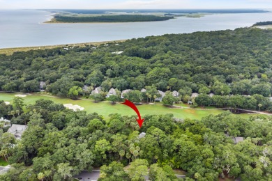 Nestled on a half-acre homesite beneath majestic oak trees on The Seabrook Island Club in South Carolina - for sale on GolfHomes.com, golf home, golf lot