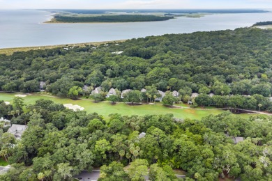 Nestled on a half-acre homesite beneath majestic oak trees on The Seabrook Island Club in South Carolina - for sale on GolfHomes.com, golf home, golf lot