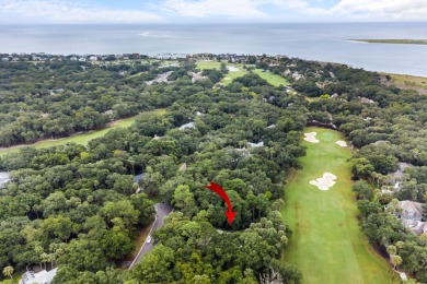 Nestled on a half-acre homesite beneath majestic oak trees on The Seabrook Island Club in South Carolina - for sale on GolfHomes.com, golf home, golf lot