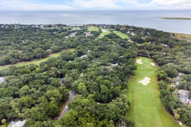 Nestled on a half-acre homesite beneath majestic oak trees on The Seabrook Island Club in South Carolina - for sale on GolfHomes.com, golf home, golf lot