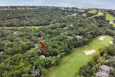 Nestled on a half-acre homesite beneath majestic oak trees on The Seabrook Island Club in South Carolina - for sale on GolfHomes.com, golf home, golf lot