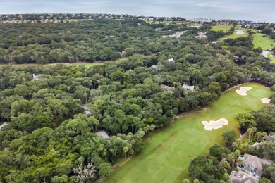 Nestled on a half-acre homesite beneath majestic oak trees on The Seabrook Island Club in South Carolina - for sale on GolfHomes.com, golf home, golf lot