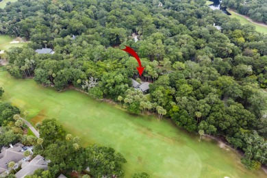 Nestled on a half-acre homesite beneath majestic oak trees on The Seabrook Island Club in South Carolina - for sale on GolfHomes.com, golf home, golf lot