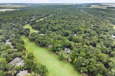 Nestled on a half-acre homesite beneath majestic oak trees on The Seabrook Island Club in South Carolina - for sale on GolfHomes.com, golf home, golf lot