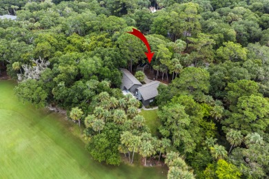 Nestled on a half-acre homesite beneath majestic oak trees on The Seabrook Island Club in South Carolina - for sale on GolfHomes.com, golf home, golf lot