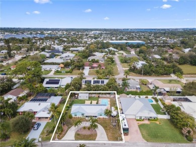 Remarkable Opportunity! Discover this Remodeled Concrete Block on Miles Grant Country Club in Florida - for sale on GolfHomes.com, golf home, golf lot