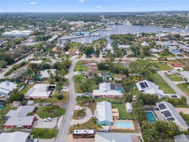 Remarkable Opportunity! Discover this Remodeled Concrete Block on Miles Grant Country Club in Florida - for sale on GolfHomes.com, golf home, golf lot