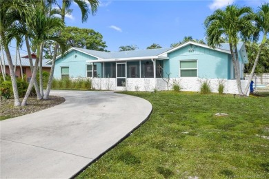 Remarkable Opportunity! Discover this Remodeled Concrete Block on Miles Grant Country Club in Florida - for sale on GolfHomes.com, golf home, golf lot