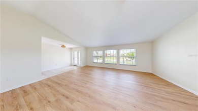 Welcome to this beautifully updated 3-bedroom, 2-bath pool home on Twin Isles Country Club in Florida - for sale on GolfHomes.com, golf home, golf lot