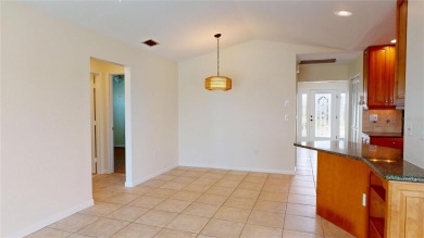 Welcome to this beautifully updated 3-bedroom, 2-bath pool home on Twin Isles Country Club in Florida - for sale on GolfHomes.com, golf home, golf lot