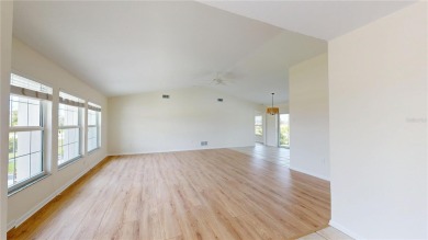 Welcome to this beautifully updated 3-bedroom, 2-bath pool home on Twin Isles Country Club in Florida - for sale on GolfHomes.com, golf home, golf lot