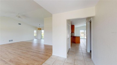 Welcome to this beautifully updated 3-bedroom, 2-bath pool home on Twin Isles Country Club in Florida - for sale on GolfHomes.com, golf home, golf lot