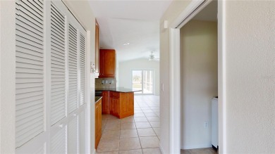 Welcome to this beautifully updated 3-bedroom, 2-bath pool home on Twin Isles Country Club in Florida - for sale on GolfHomes.com, golf home, golf lot