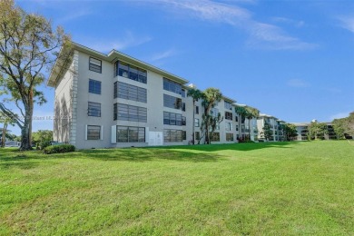 THIS 2 BEDROOM 2 BATHROOM WHITEHIALL 1 CONDO IS LOCATED IN A on Pine Island Ridge Country Club in Florida - for sale on GolfHomes.com, golf home, golf lot