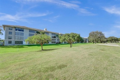 THIS 2 BEDROOM 2 BATHROOM WHITEHIALL 1 CONDO IS LOCATED IN A on Pine Island Ridge Country Club in Florida - for sale on GolfHomes.com, golf home, golf lot