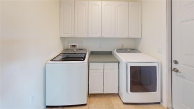 Welcome to this beautifully updated 3-bedroom, 2-bath pool home on Twin Isles Country Club in Florida - for sale on GolfHomes.com, golf home, golf lot