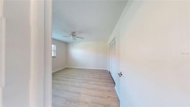 Welcome to this beautifully updated 3-bedroom, 2-bath pool home on Twin Isles Country Club in Florida - for sale on GolfHomes.com, golf home, golf lot