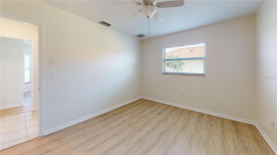 Welcome to this beautifully updated 3-bedroom, 2-bath pool home on Twin Isles Country Club in Florida - for sale on GolfHomes.com, golf home, golf lot