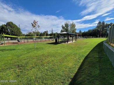 This stunning brand-new, heavily upgraded 2024 Champion home on Silver Creek Golf Club in Arizona - for sale on GolfHomes.com, golf home, golf lot