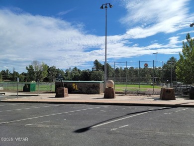 This stunning brand-new, heavily upgraded 2024 Champion home on Silver Creek Golf Club in Arizona - for sale on GolfHomes.com, golf home, golf lot