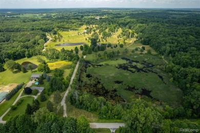 123+ Acres with a Lake, 2 Pole Barns, a Club House & a 2 Bed/2 on Arcadia Hills Golf Course in Michigan - for sale on GolfHomes.com, golf home, golf lot