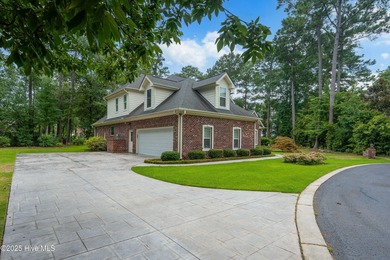 Welcome to 704 Squire Lane, where timeless elegance meets modern on Porters Neck Country Club in North Carolina - for sale on GolfHomes.com, golf home, golf lot