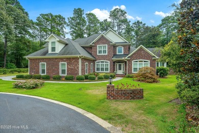 Welcome to 704 Squire Lane, where timeless elegance meets modern on Porters Neck Country Club in North Carolina - for sale on GolfHomes.com, golf home, golf lot