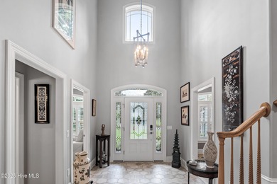 Welcome to 704 Squire Lane, where timeless elegance meets modern on Porters Neck Country Club in North Carolina - for sale on GolfHomes.com, golf home, golf lot