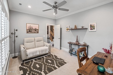 Welcome to 704 Squire Lane, where timeless elegance meets modern on Porters Neck Country Club in North Carolina - for sale on GolfHomes.com, golf home, golf lot