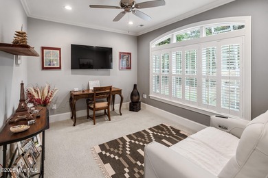 Welcome to 704 Squire Lane, where timeless elegance meets modern on Porters Neck Country Club in North Carolina - for sale on GolfHomes.com, golf home, golf lot