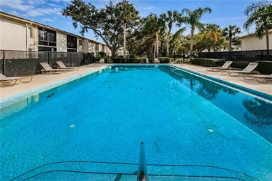 Welcome to a condo that instantly feels like home the moment you on East Lake Woodlands Country Club in Florida - for sale on GolfHomes.com, golf home, golf lot