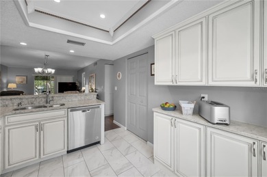 Welcome to a condo that instantly feels like home the moment you on East Lake Woodlands Country Club in Florida - for sale on GolfHomes.com, golf home, golf lot