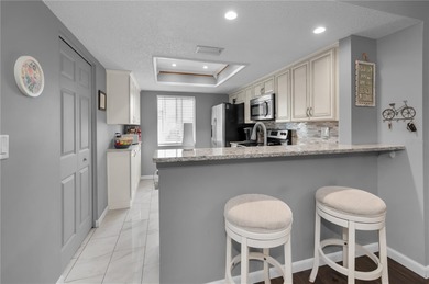 Welcome to a condo that instantly feels like home the moment you on East Lake Woodlands Country Club in Florida - for sale on GolfHomes.com, golf home, golf lot