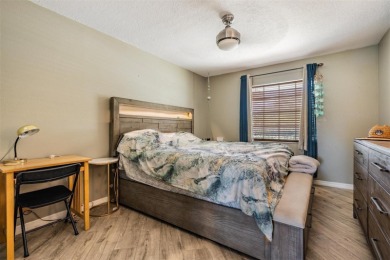 Welcome to this beautifully maintained 3-bedroom, 2-bathroom on Oak Hills Country Club in Florida - for sale on GolfHomes.com, golf home, golf lot