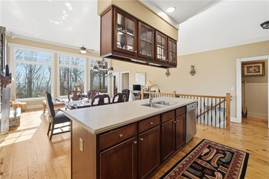 At 2,600-foot elevation, this stunning Craftsman-style retreat on Big Canoe Golf Club - Cherokee in Georgia - for sale on GolfHomes.com, golf home, golf lot