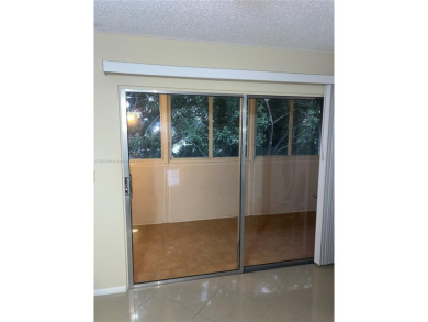 1 BEDROOM,1.1/5 BATHROOM,TILE FLOOR THROUGH OUT, NEW A/C on Wynmoor Golf Course in Florida - for sale on GolfHomes.com, golf home, golf lot